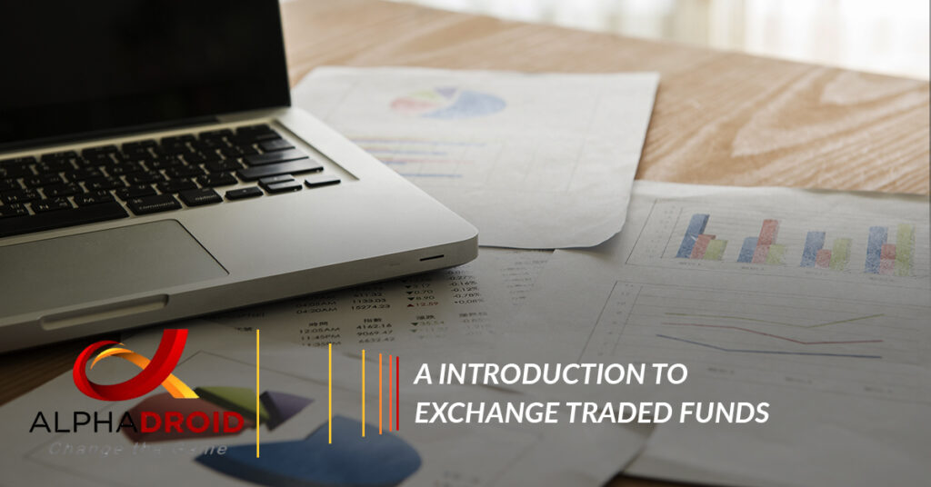 charts and a laptop on desk