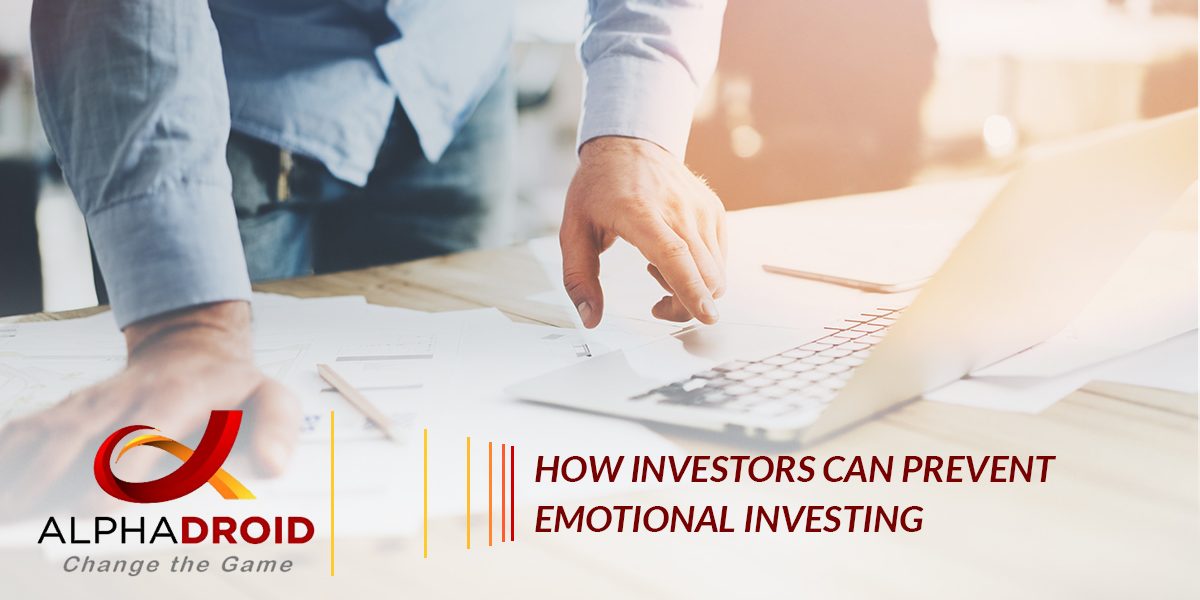 Laptop and papers on desk