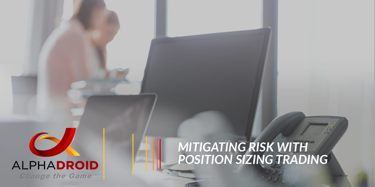 Computers and phone at a workstation