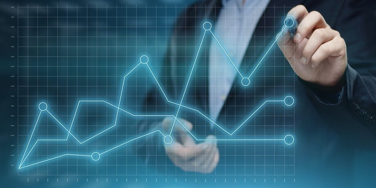 businessman with charts graphic